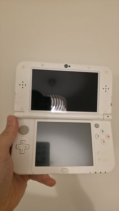 New Nintendo 3DS XL, Modat,2000 jocuri, 21-în-1, gata de jo