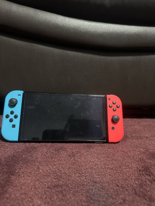Nintendo switch oled cu geanta si jocul minecraft