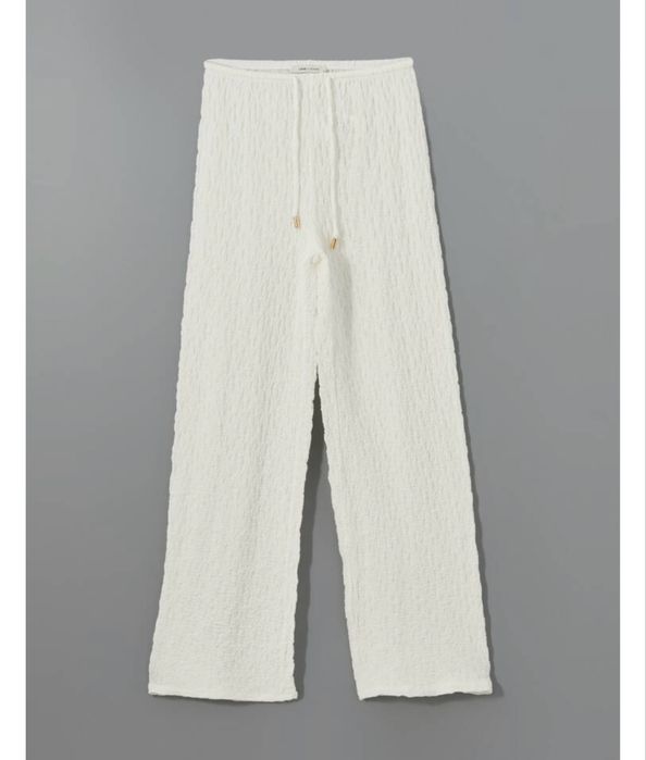 Брюки  белые широкие