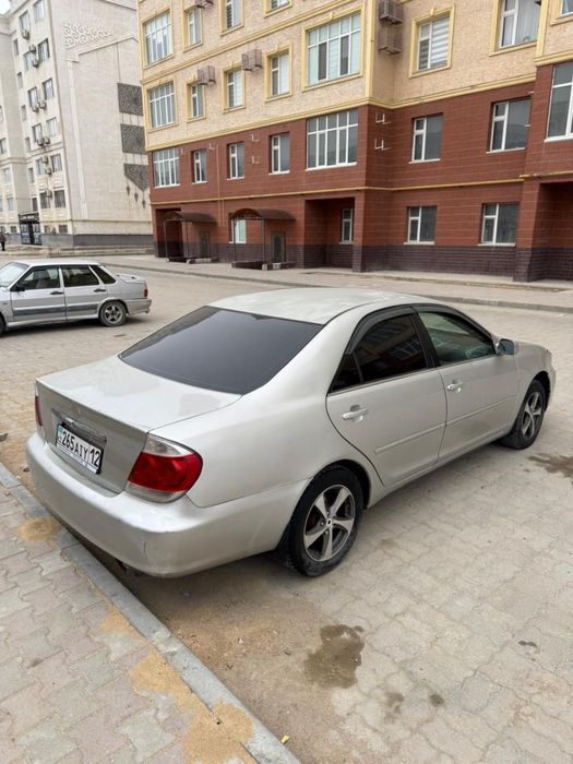 Машина Камри 35