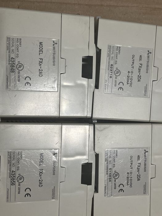 Lot Mitsubishi PLC FX2N-16MR-ES/UL + 4x FX2N-2DA + Sursă Mean Well DR-30-24 – Automatizări Industriale