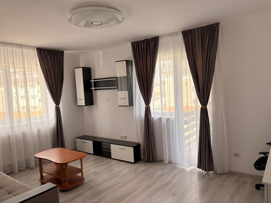 Apartament complet mobilat cu 2 camere și loc de parcare cu CF,