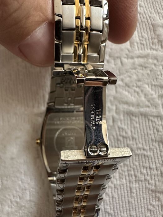 Часы швейцарский марки Romanson