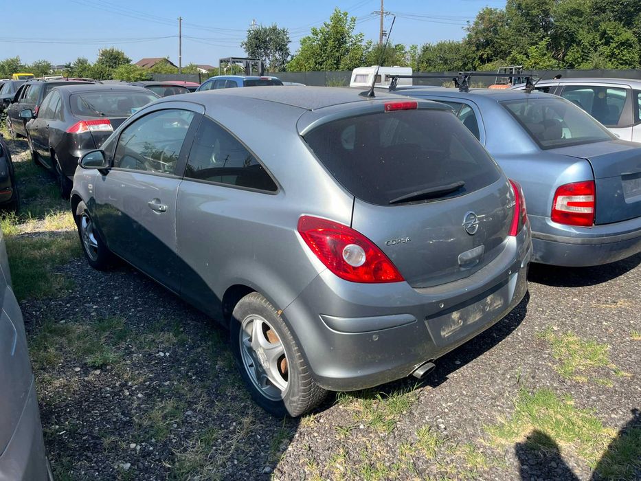 Dezmembrez Opel Corsa D facelift 2011 coupe 1,3 diesel EcoFlex gri Z179