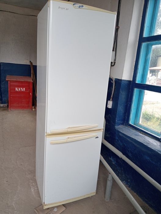Продам бу холодильник марка позис.