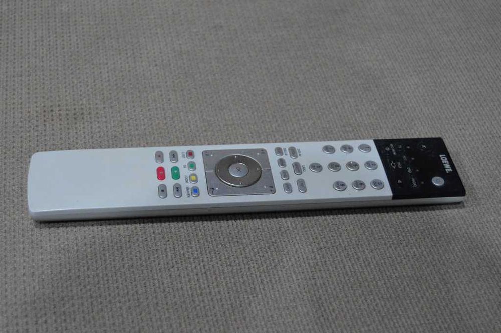 Telecomandă Originală Loewe Assist 2 (Cod 89950A10) cu Capac – Stare Bună