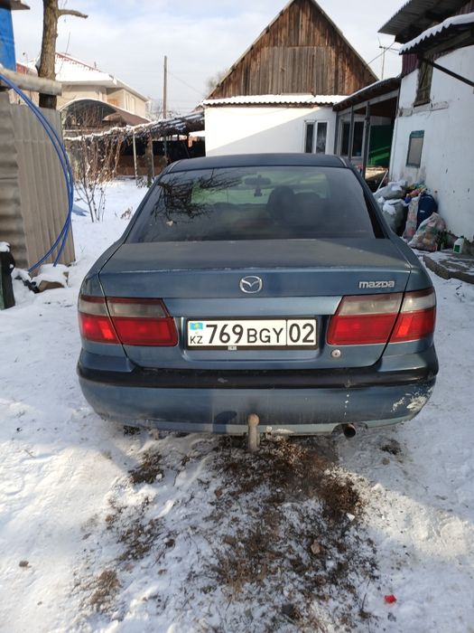 Мазда 626 fe машина на полном ходу