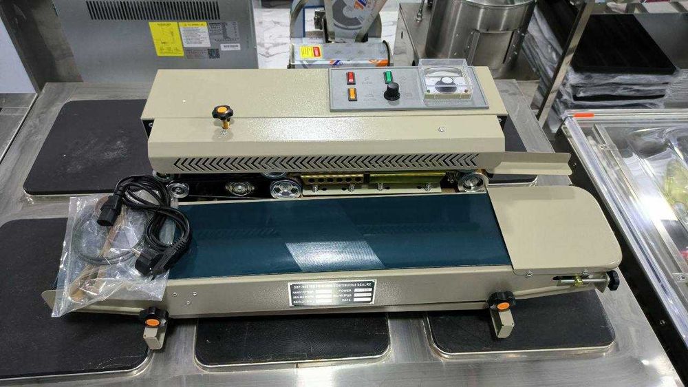 Лентали қадоқлаш ускунаси Ленточный упаковочный аппарат Tasmali dazmol