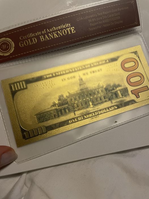Bancnote 100 dolari aurite
