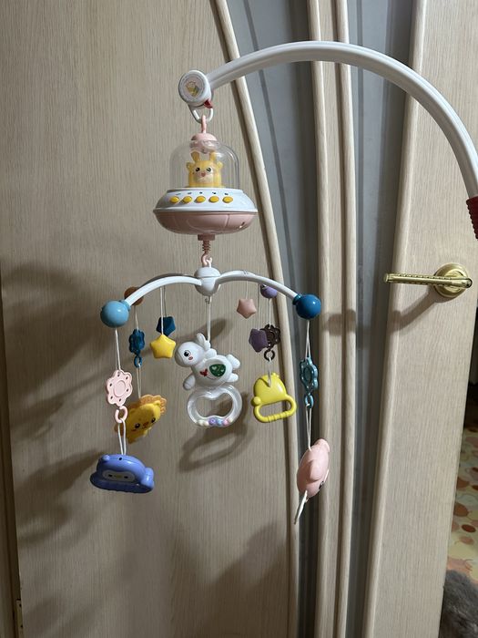 Музыкальный мобиль в кроватку