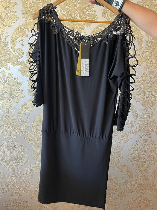 Женская/мужская одежда