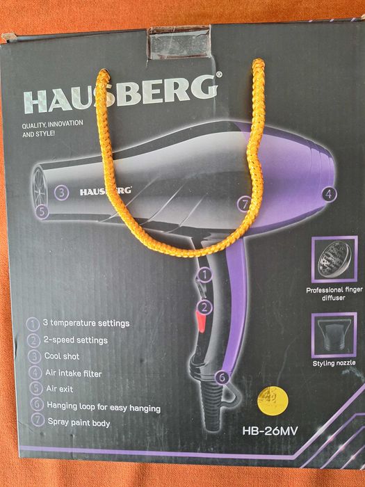 Uscătorul de păr Hausberg HB-26MV (negru-mov) este un aparat compact și puternic de 2000–2400W, ideal atât pentru utilizare acasă, cât / călătorii