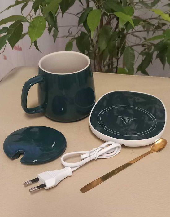 Set nou cadou: cana ceramica verde cu incalzitor electric ideala pentru birou