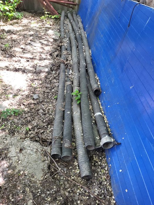 Мотопомпа для грязной воды со шлангами.