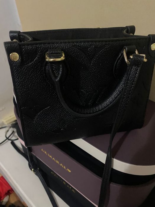 Сумка өте адемі қолданылмаған таза