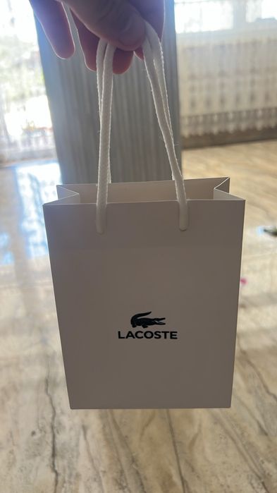 Brățară Lacoste.