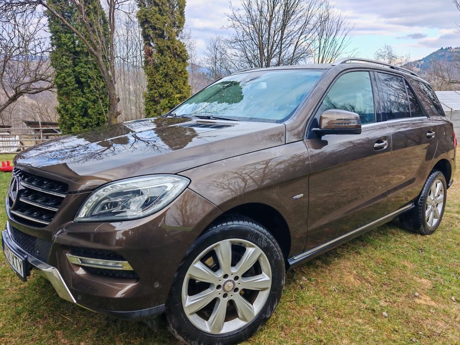 Mercedes ML impecabil .