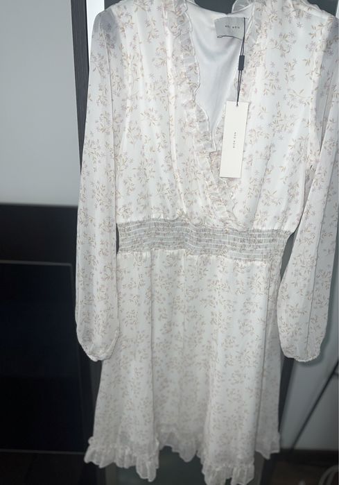 Rochie de damǎ cu flori