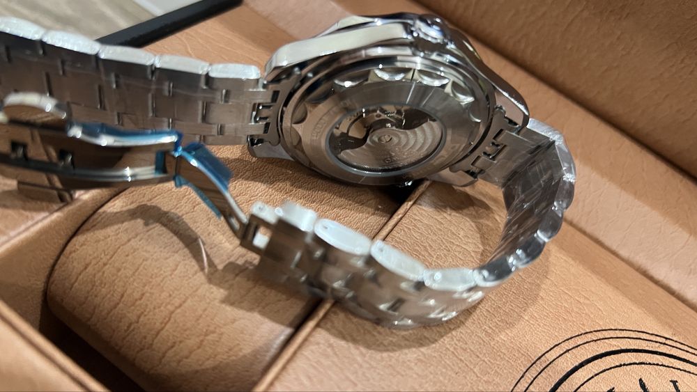 часы Omega механические