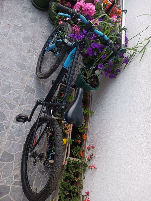 Vând bicicletă B twin roti 24"