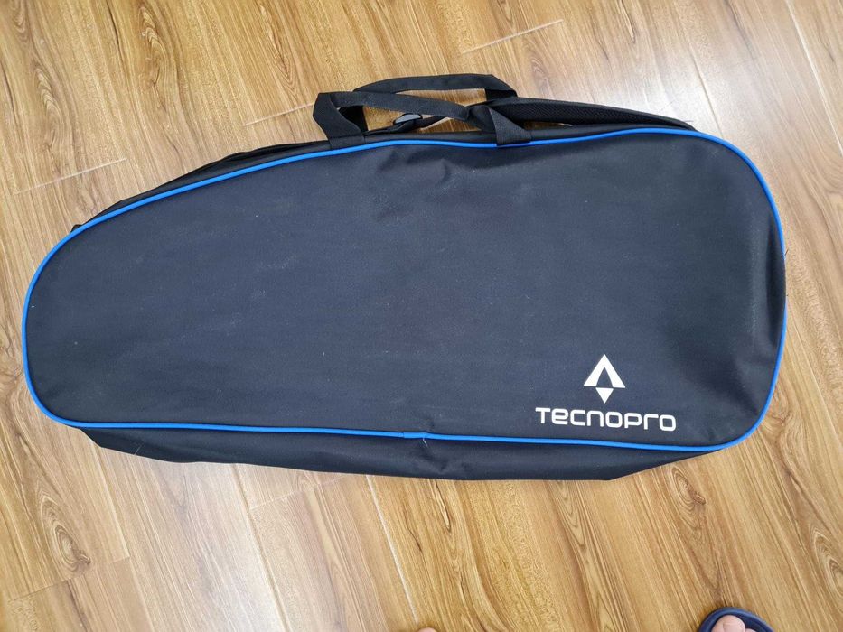 Set: Racheta Fisher, Geanta Tecnopro, 2 seturi mingi Wilson, grip Head
