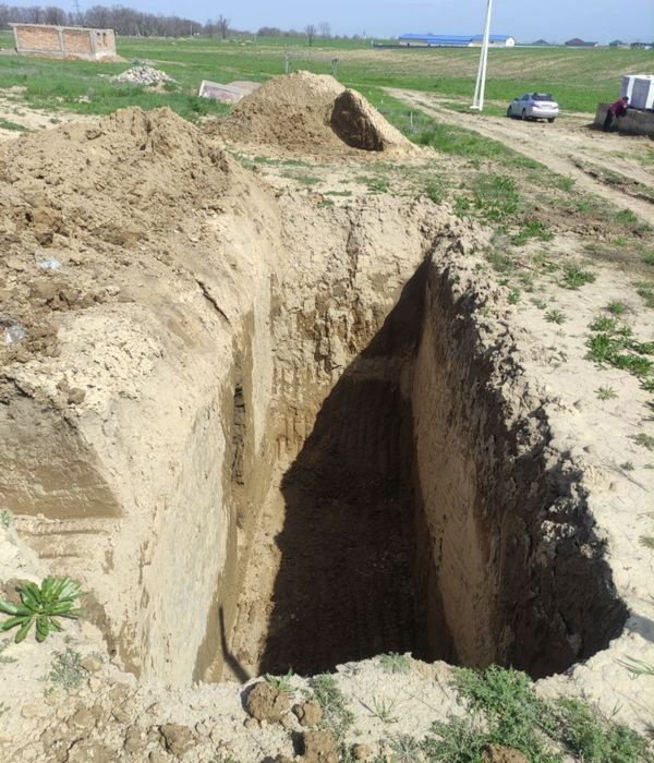 Услуга эксковатора-погрузчика