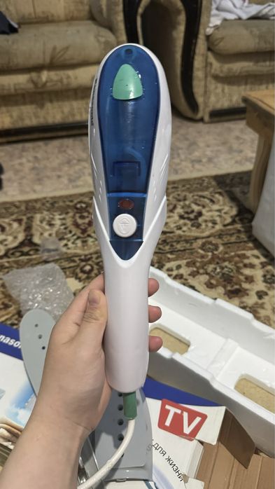 Отпариватель, паровой утюг