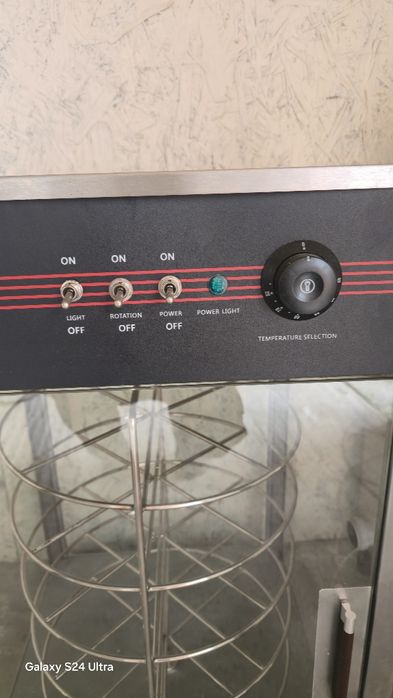 Vand vitrina calda rotativa pentru pizza, senvisuri etc .