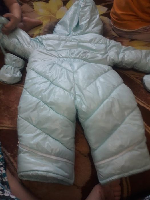 Срочно продам детский зимний комбинезон