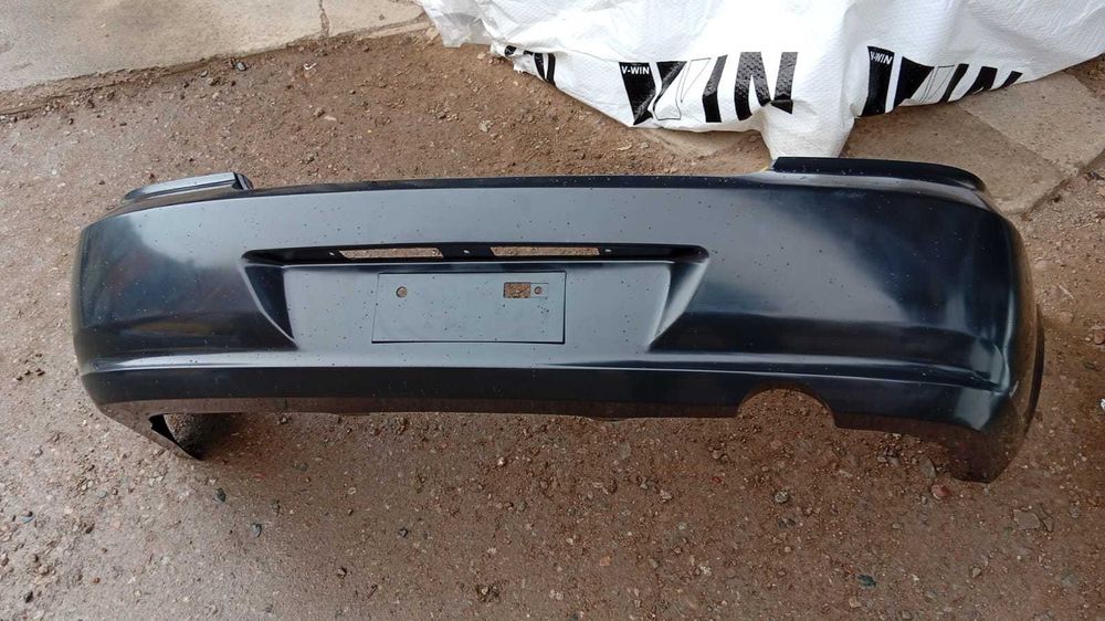 Бампер задний на Nissan Almera Classic 07-10/Алмера Классик 07-10