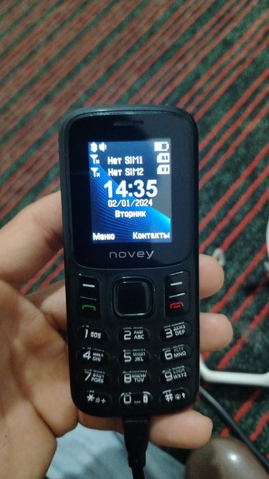 Novey M 185  Samsung J100