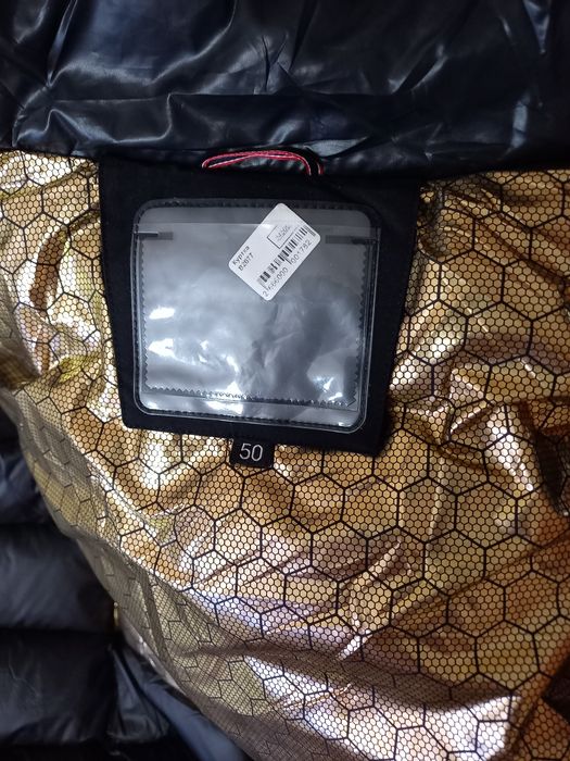 Продам женский пуховик