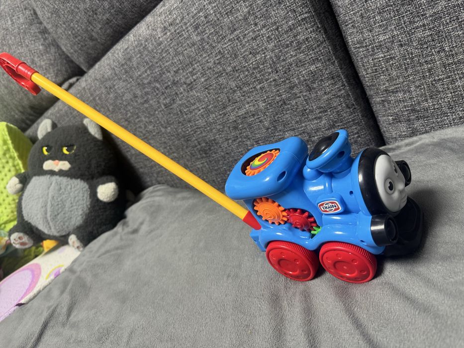 Игрушка-каталка поровозик