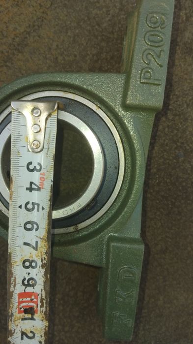 Продам подшипник в корпусе.