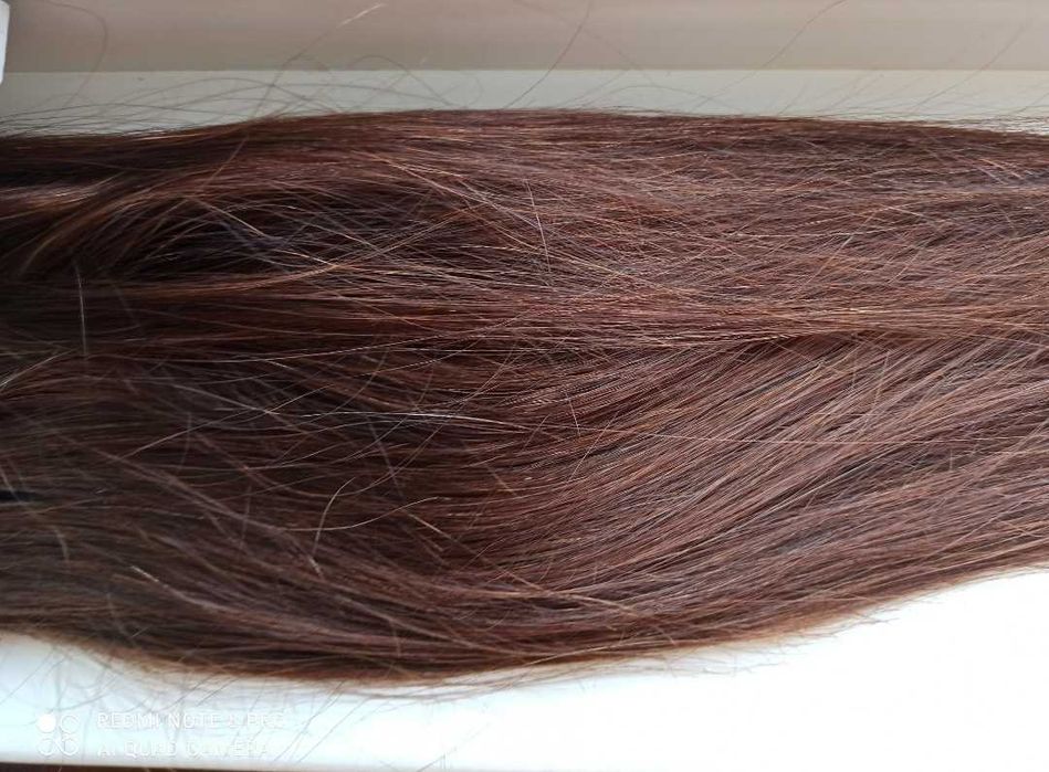 Естествена коса на треса.Дълга 60 см.