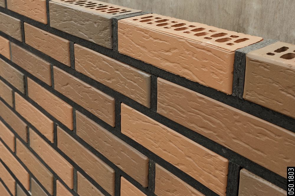 Облицовочный коричневый кирпич