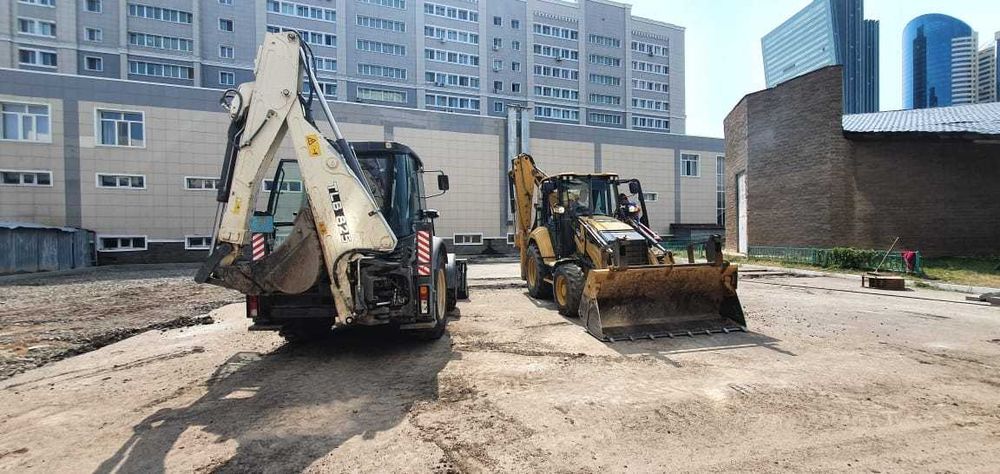 Экскаватор-погрузчик
