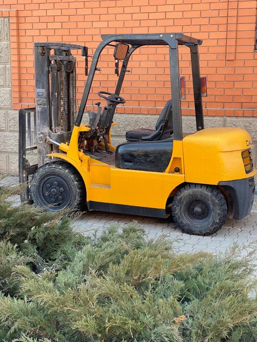Кара погрузчик жёлтый