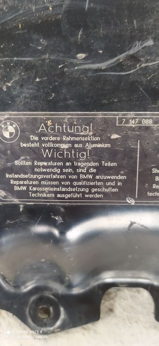 БМВ  телевизор ,рамка капота ,усилитель бампера