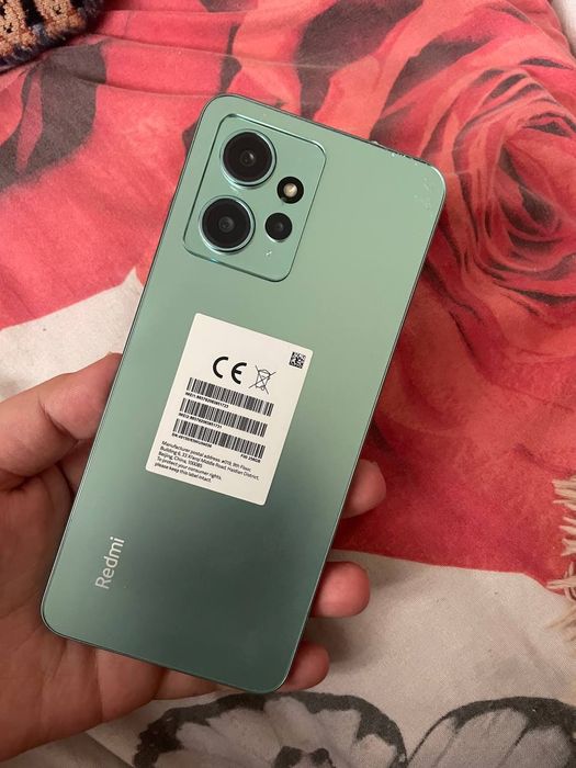 Red mi 12Pro qiz bola tutgan