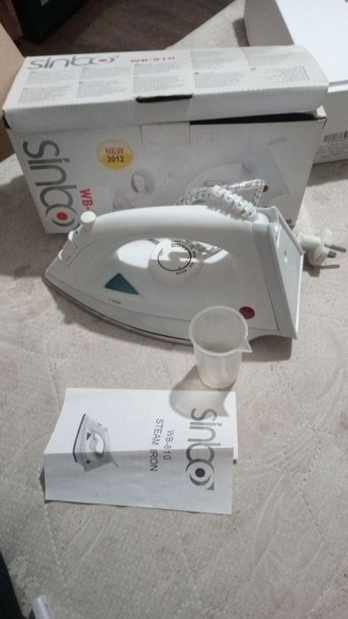 Продам утюг б/у фирма sinbo