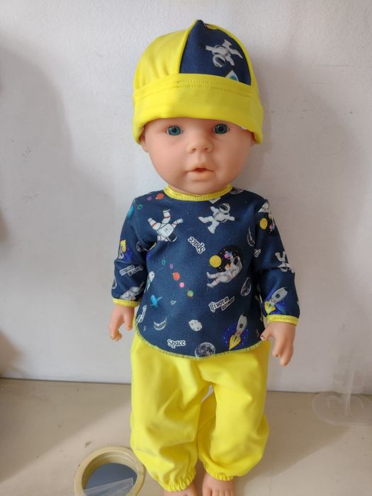 Дрехи за кукли бебета