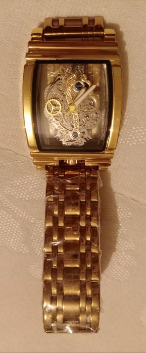 Новые часы скелетон мужские позолоченые