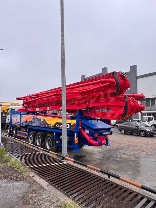 Автобетононасос KCP 60 метров на шасси HOWO SITRAK 10х4 CIP TASHKENT