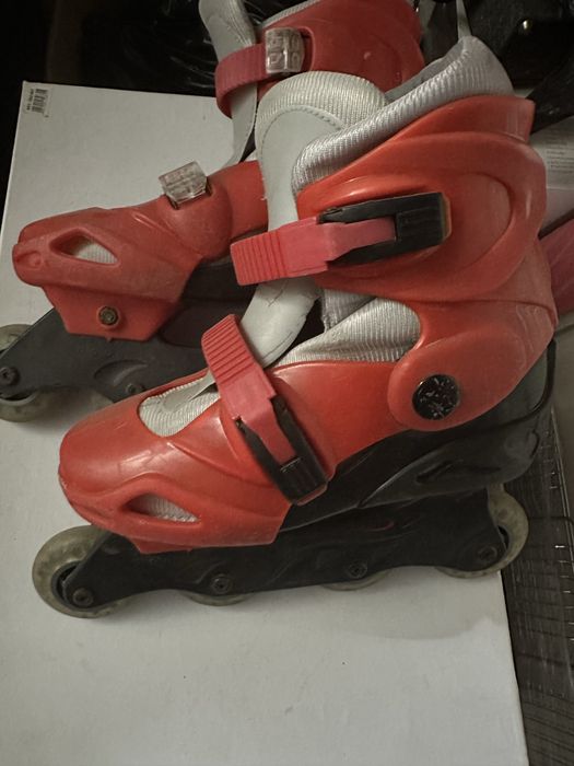 Роликовые коньки