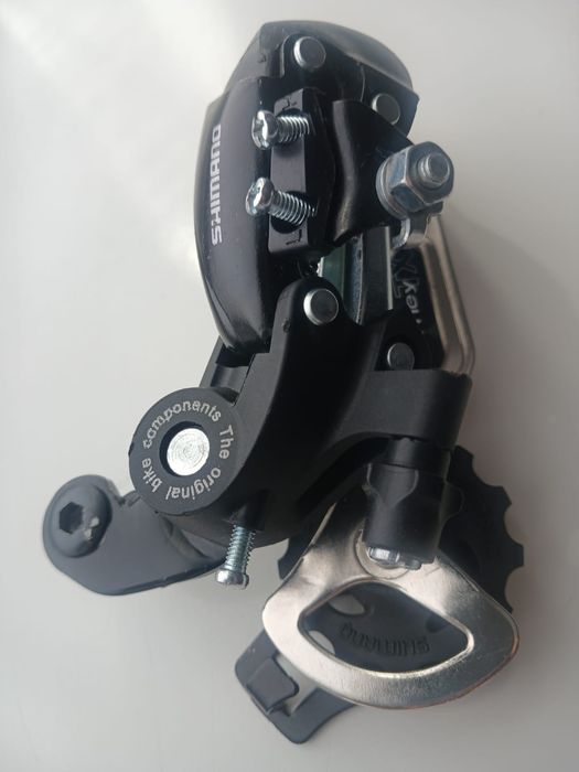 На спортивный велосипед новый задний переключатель SHIMANO  оригинал