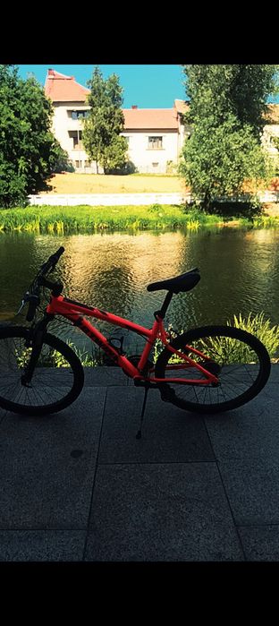 Vând bicicleta rockrider portocaliu b'twin