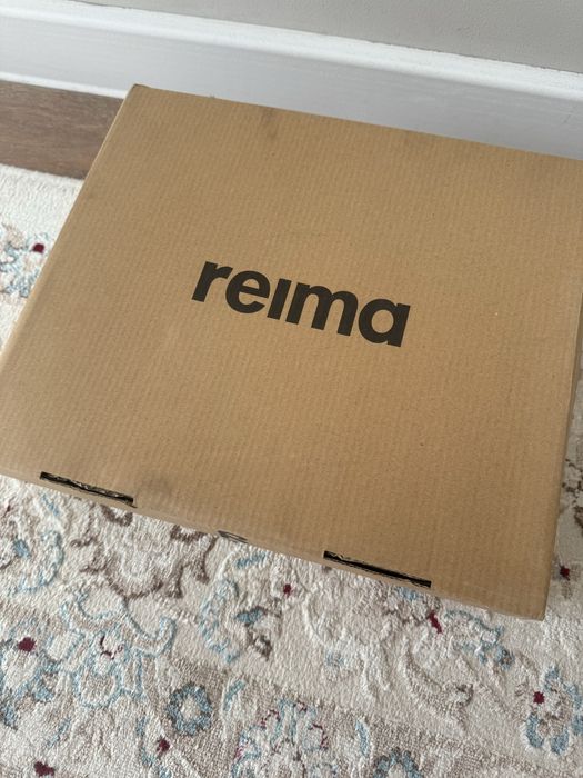 Продам сапоги reima
