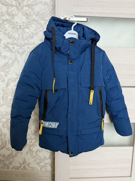 Продам зимнюю куртку на мальчика 7-9 лет