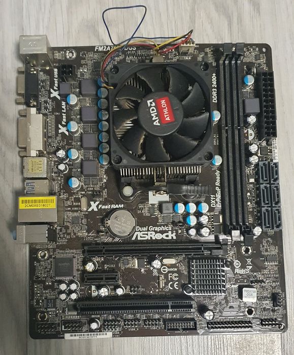 Продавам дънна платка ASRock FM2A75M-DGS с AMD процесор и охладител